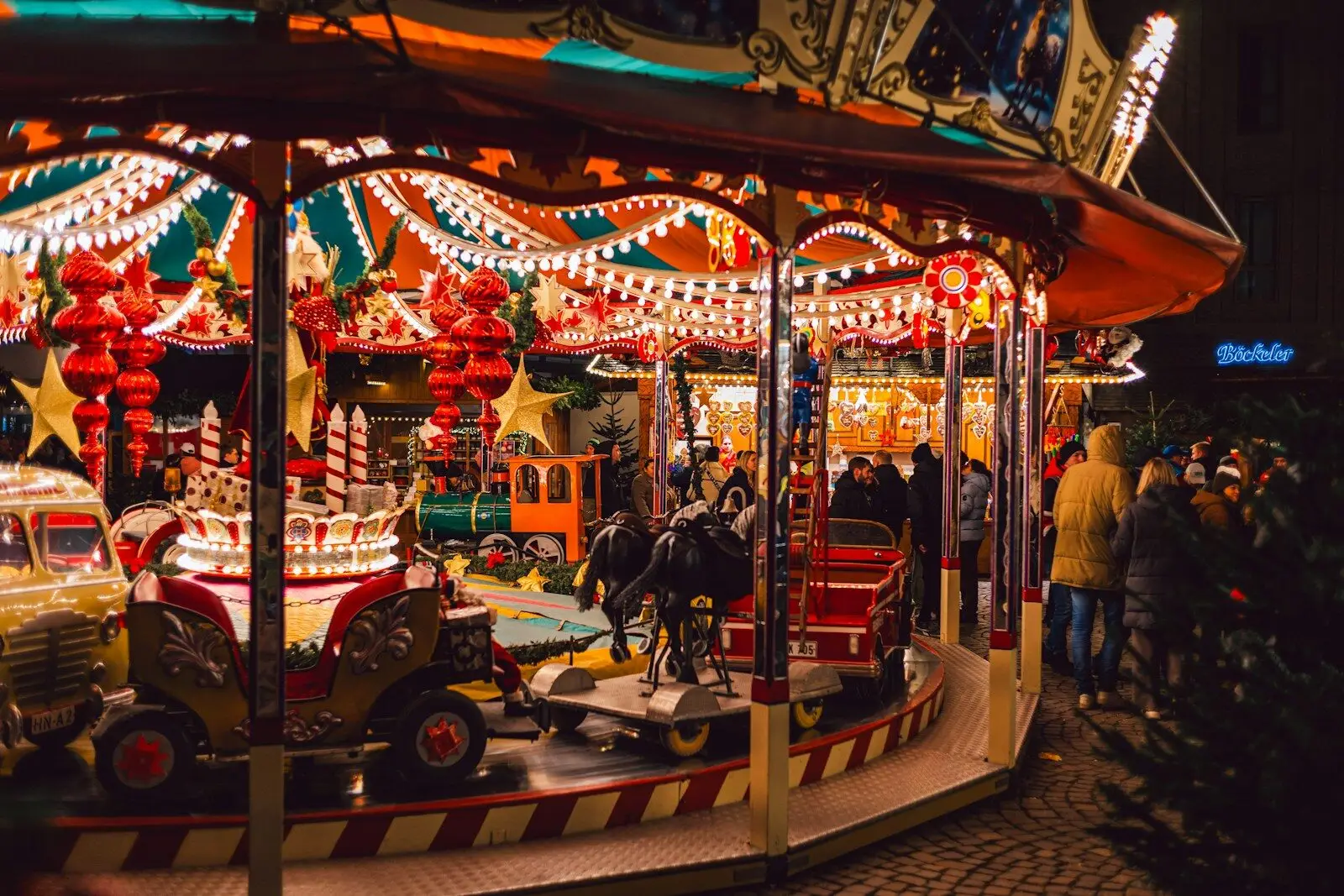Carousel with flying chairs combining two ride experiences