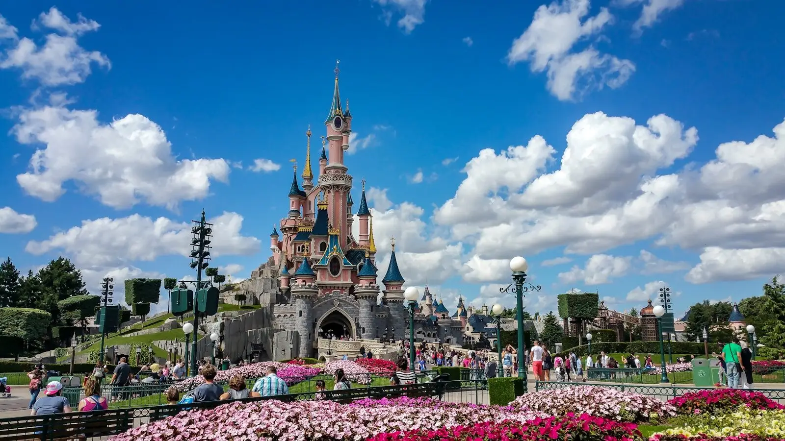 a castle with a lot of people around it