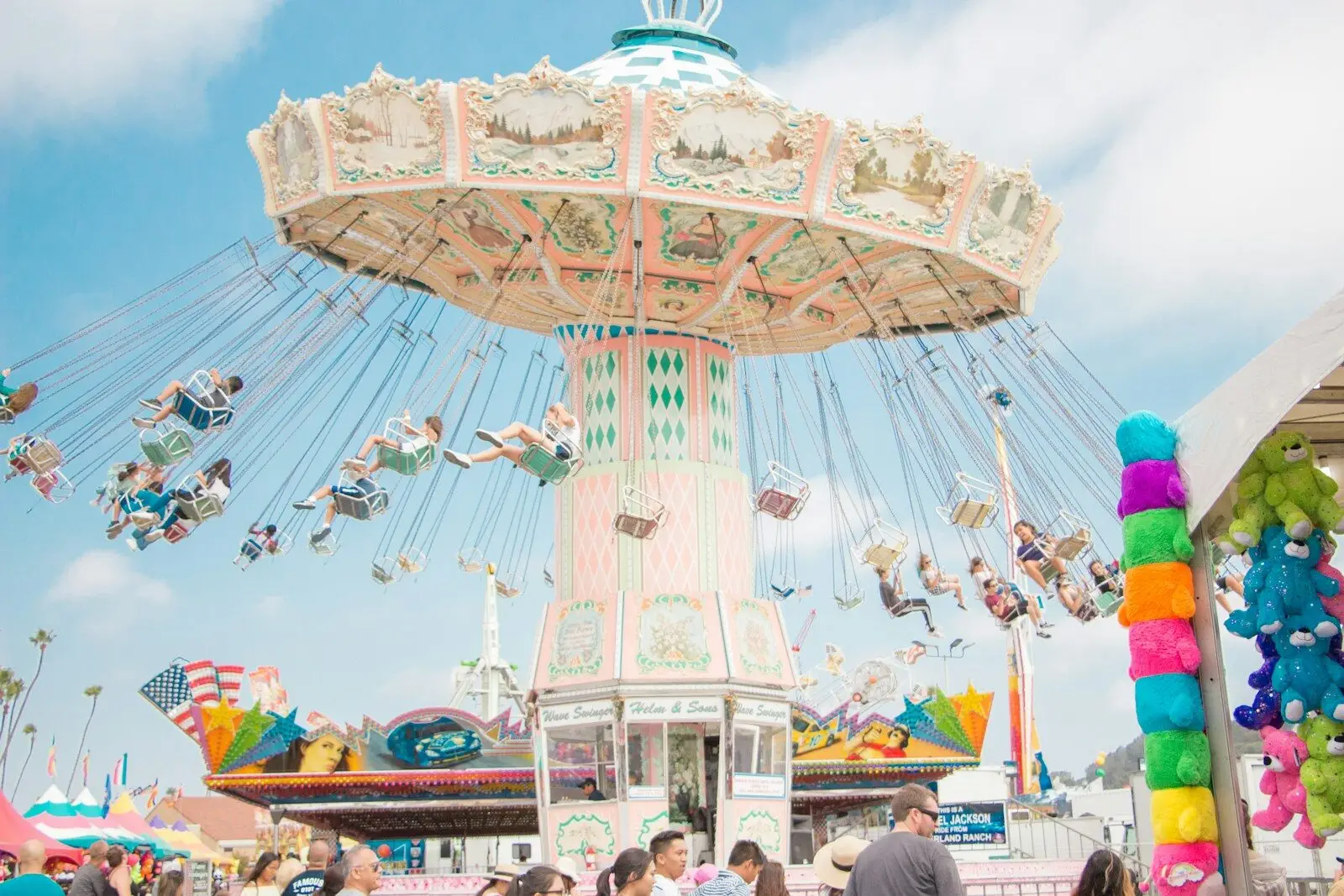 Colorful carousel with decorated horses and LED lights