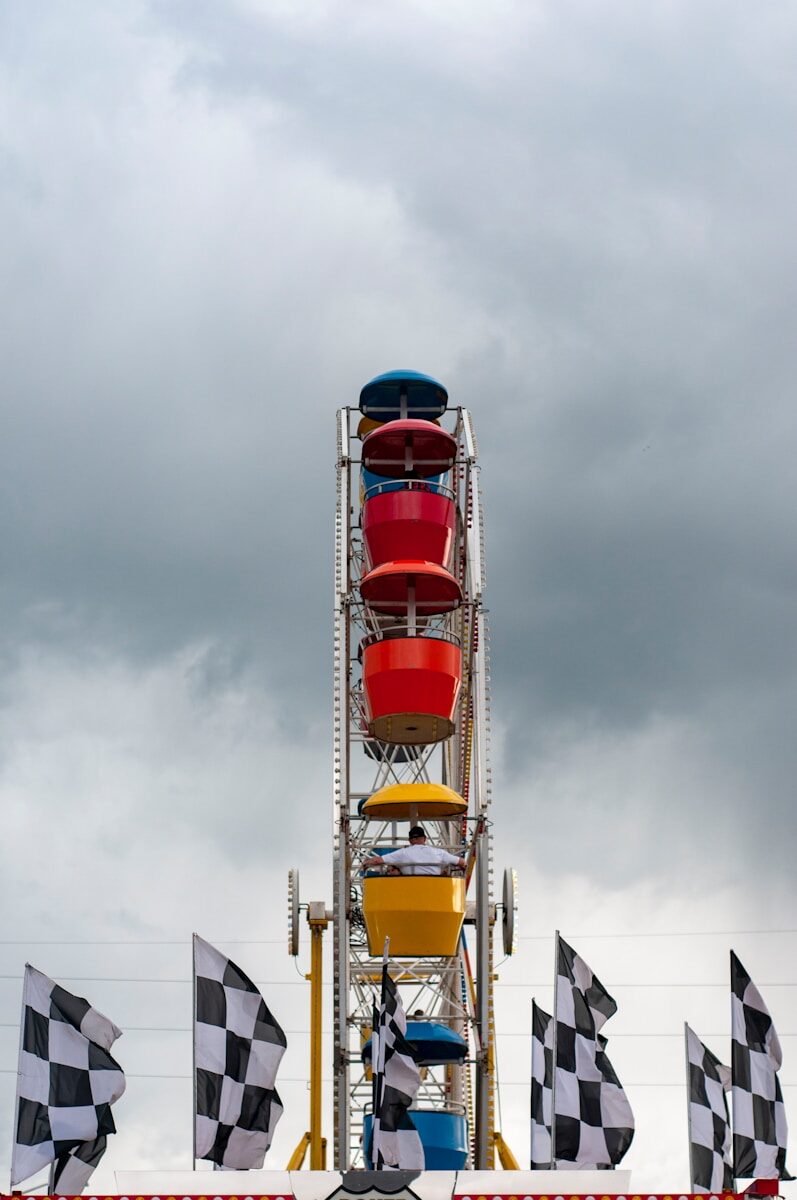 a ferris wheel with a checkered flag on it