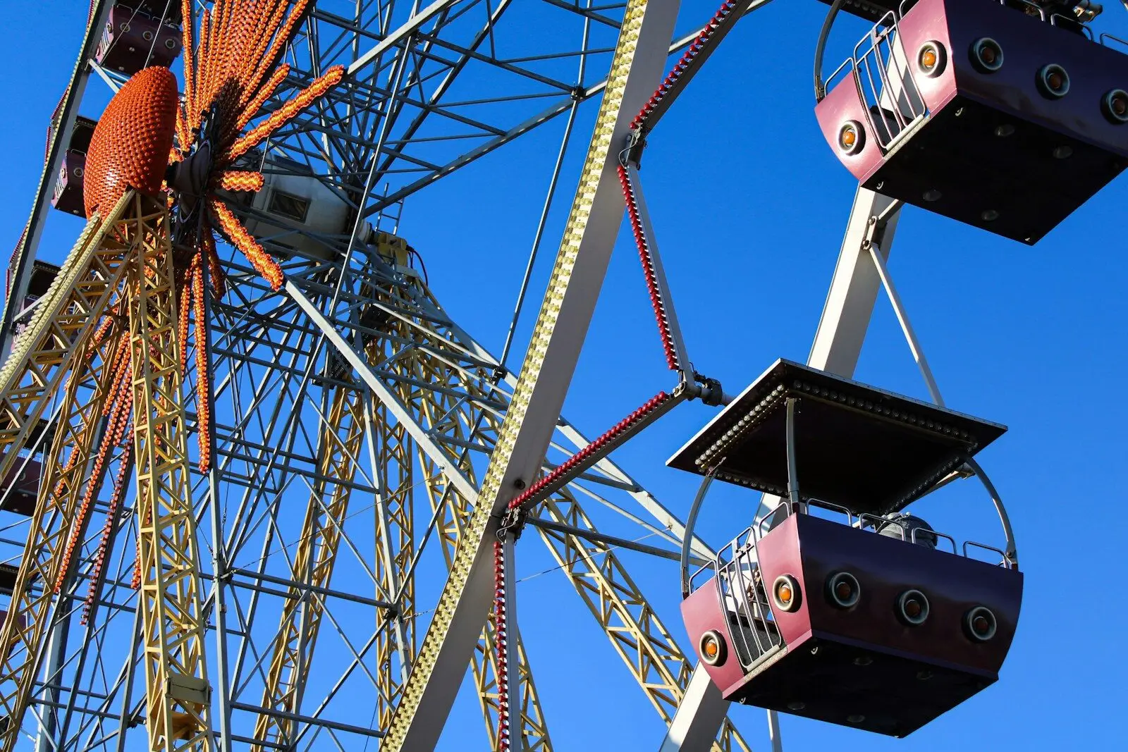 a ferris wheel with a blue sky in the background