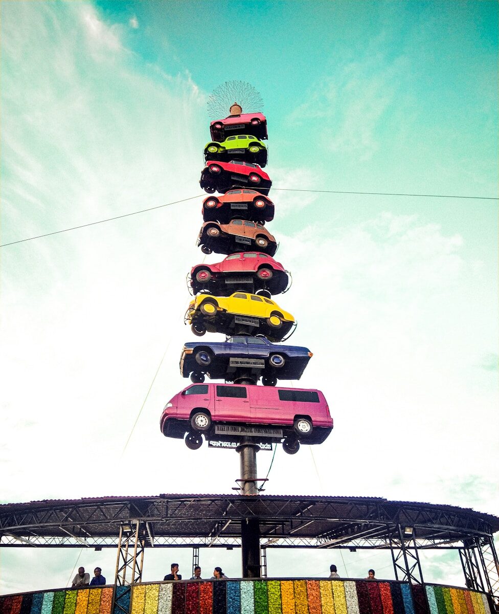 low-angle photography of car tower