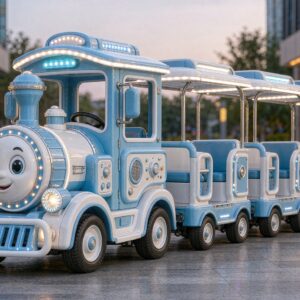 Electric trackless train with cartoon locomotive and carriages